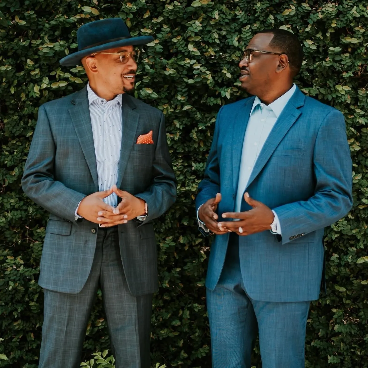 Attorneys Charles Gee and Adaryll Lee talking together outdoors
